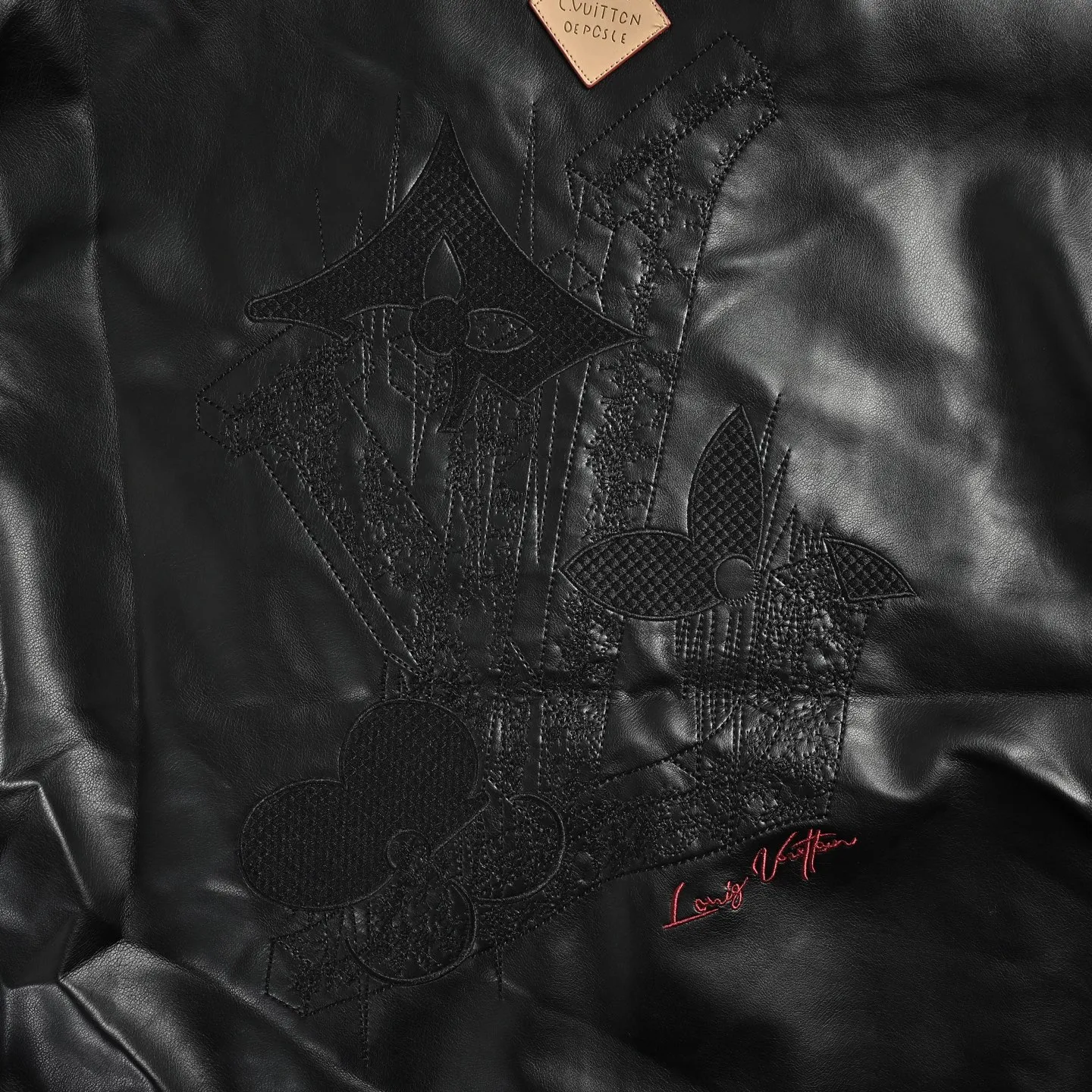 Louis Vuitton Louis Vuitton three-flower embroidered logo lapel leather jacket